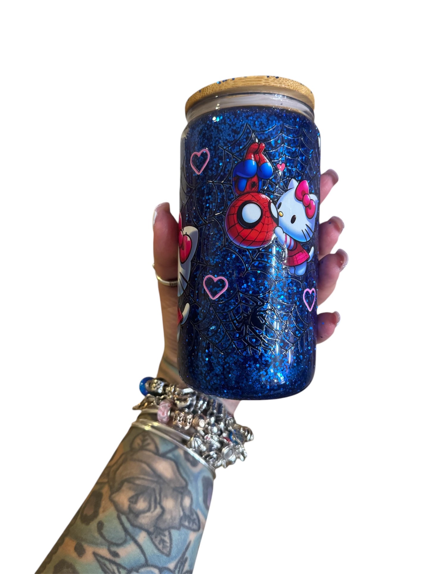 Hello kitty and Spider-Man snowglobe cup
